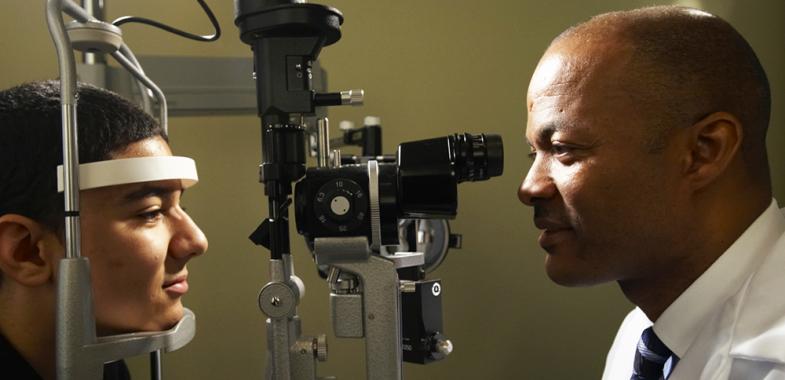 Young man having his eyes checked